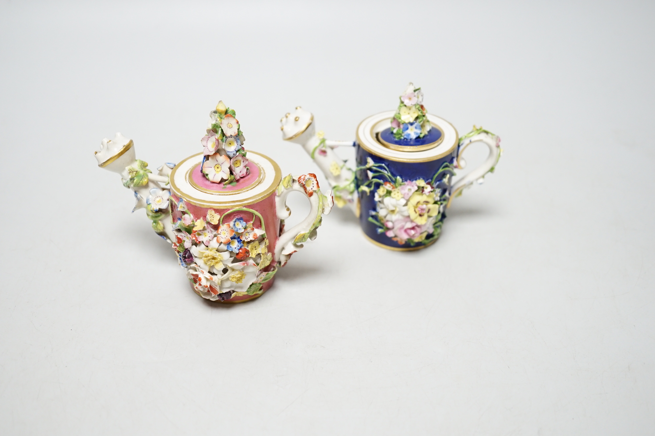 Two Derby porcelain floral encrusted miniature water sprinklers, circa 1825, tallest 10cm